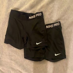 Set of 2 Nike pros. size are Youth L/ Adult XS (no size tag)